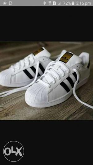 Pair Of White-and-black Adidas Supestar