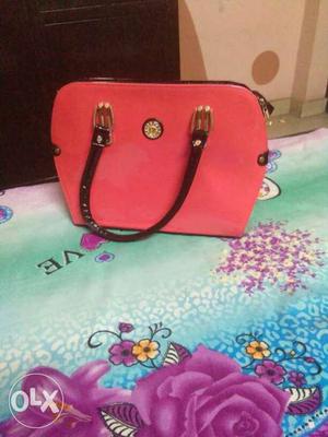 Pink And Brown Leather Handbag