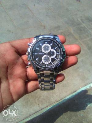 Round Silver Chronograph Watch With Chain Link
