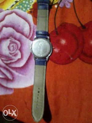 Round Watch With White Leather Strap