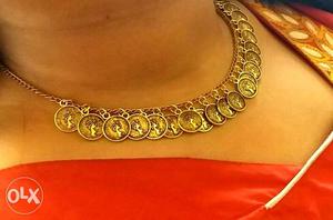 This is brand new oxidized golden gini har necklace