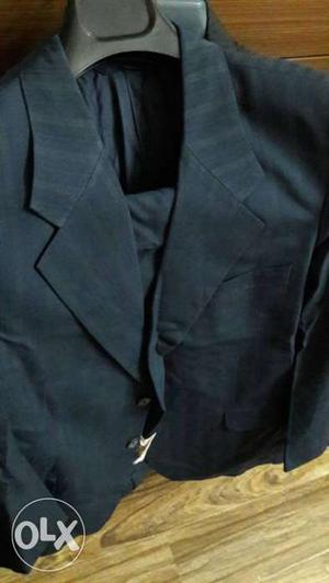Woollen men suits size 40 in colours like blue, black,