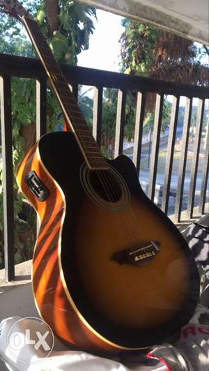 Matre Semi Acoustic guitar with volume and tone knobs.