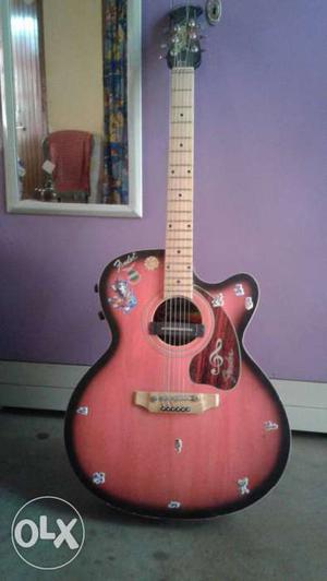 Pink And Black Cutaway Acoustic Guitar