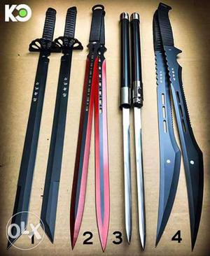 4 Pairs Of Black Handled Weapons