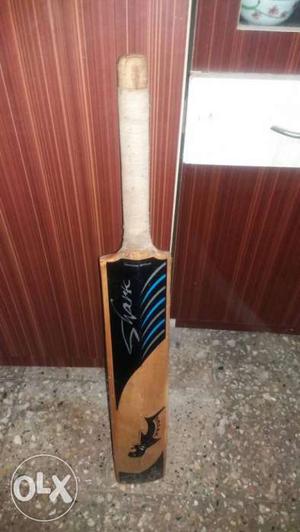 Brown And Black Cricket Paddle