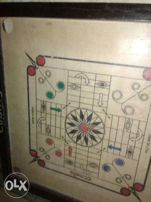 Brown And Red Wooden Carrom Board