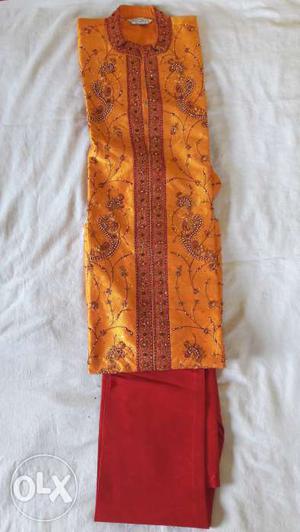 Exclusive mens ethnic orange kurta with red bottom,
