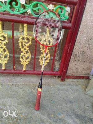 Red, Black And White Badminton Racket