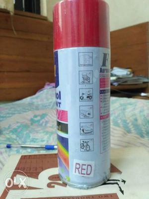 Red Labeled Spray Bottle