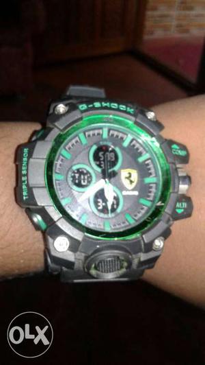 Round Black And Green Ferarri Chronograph Watch