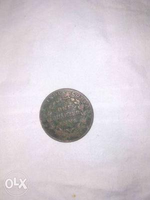 Round Bronze One Quarter Indian Coin