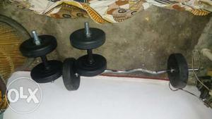Weight Plates And Stainless Steel Barbell