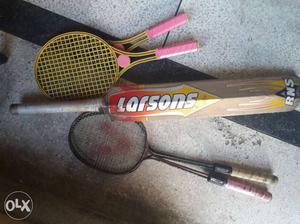 Yellow Table Tennis Rcket; Brown Larsons Cricket;White