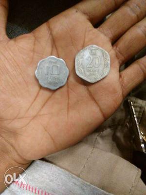  paisa coin.  and  respectively