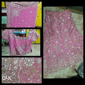 A baby pink heavy party wear lahenga..with