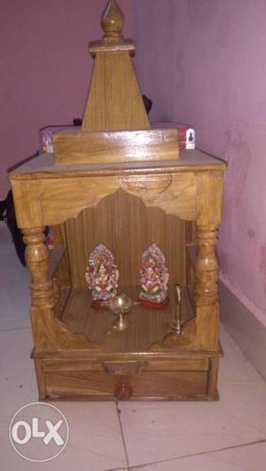A wooden mandir available at affordable price