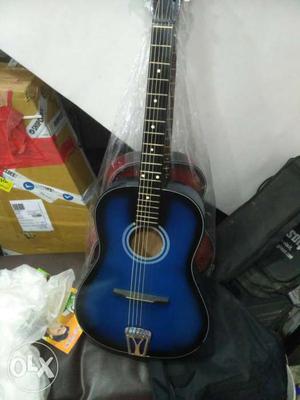 Amazing looking blue colour guitar, call