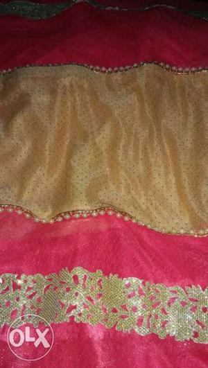 Gold And Pink Textile
