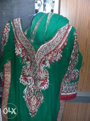 Green Emroided suit.Churidar and dupatta