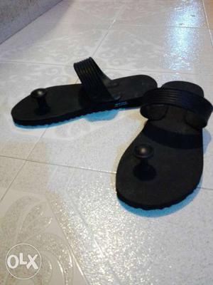 Pair Of Black Flip Flops