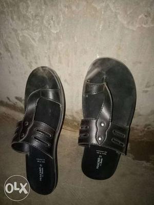 Pair Of Black Leather Flip Flops