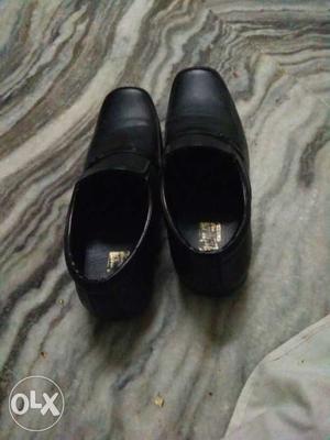 Pair Of Black Slip One Shoes