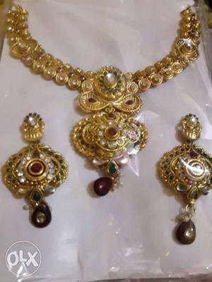 Pair Of Gold Earrings And Necklace