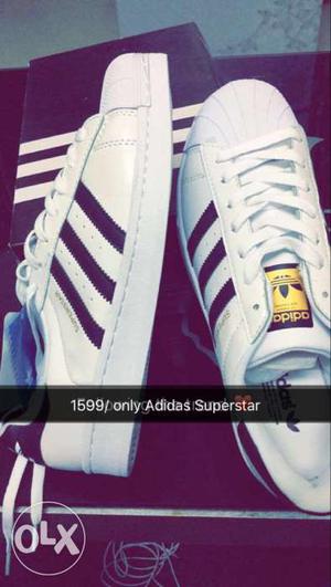Pair Of White Adidas Superstar On Box