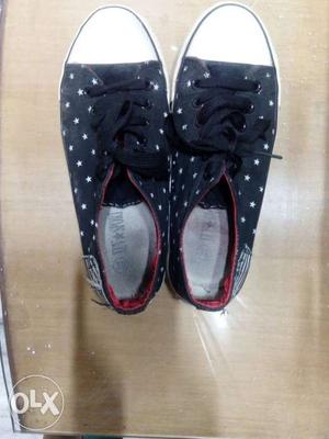 Pair Of White-and-black Polka-dotted Low Top Sneakers
