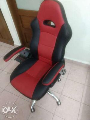 Red And Black Leather Rolling Armchair