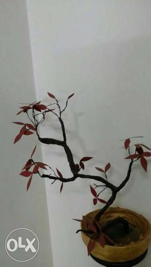Red tree with iron branch, paper vase
