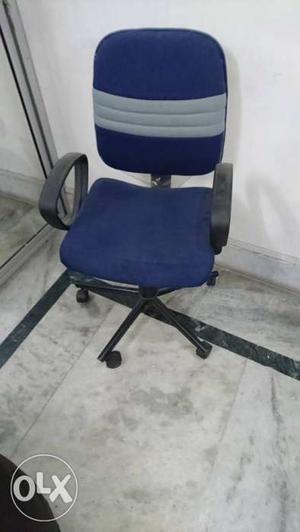 Revolving office chair. One roller to be