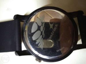 Round Framed Watch With Black Straps