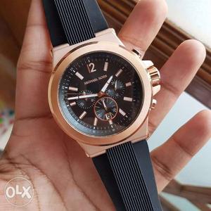 Round Gold Michael Kors Chronograph Watch With Black Strap