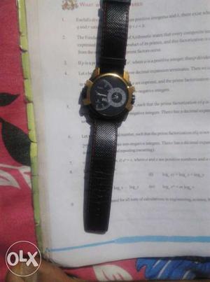 Times Round Black And Gold Chronograph Watch With Black