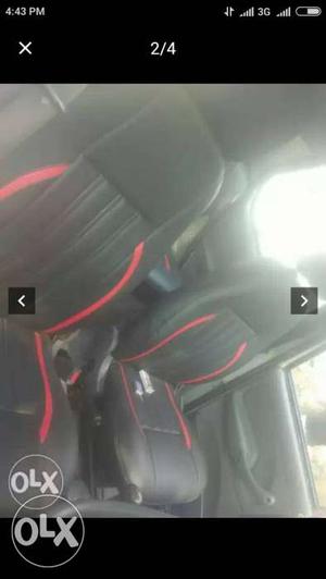 Two Black And Red Leather Car Seats Screenshot