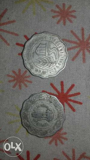 Two Silver Flower Shape Coins
