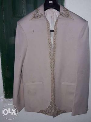 White And Brown Jacket