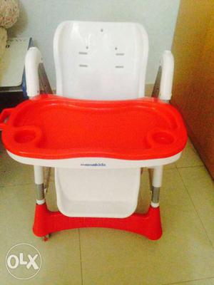 White And Red Feeding Chair