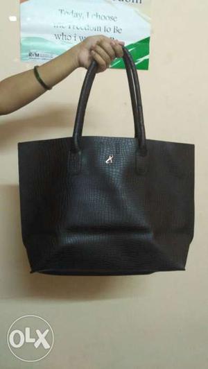 Woman new leather hand bag