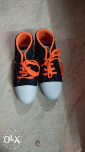 Women's Pair Of Orange-and-white High Top Sneakers