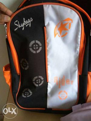Black, White And Orange Skybags Backpack