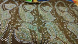 Brown White And Green Paisley Pattern Textile