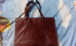 Brown handbag with 5 divisions at very reasonable