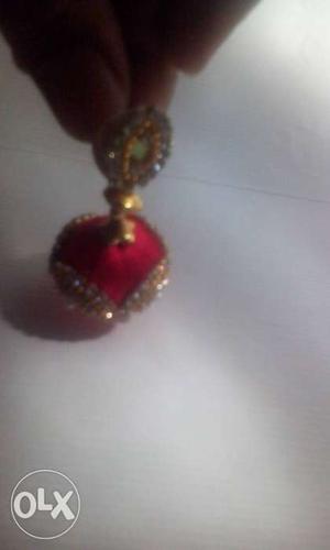 Gold And Red Accessory