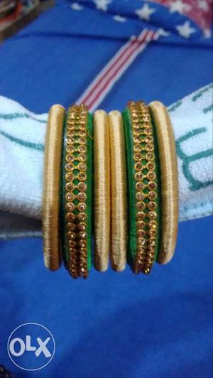 Green and gold colour silk thread bangles