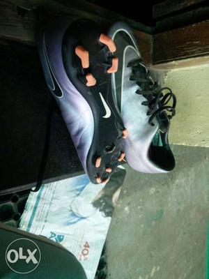 Grey-purple-black Nike Cleats