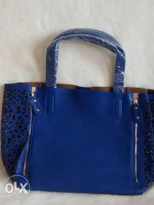 Ladies handbag with jali work..and small bag free