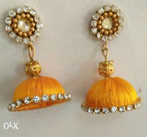 Pair of yellow silk thread earrings